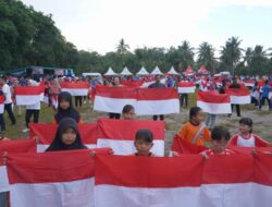 Pj Gubernur Suganda Kibarkan Bendera Merah Putih Bersama Warga Bintet